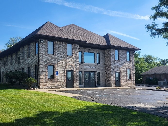 Two-storey brick and stone office building at 2490 Walton Boulevard